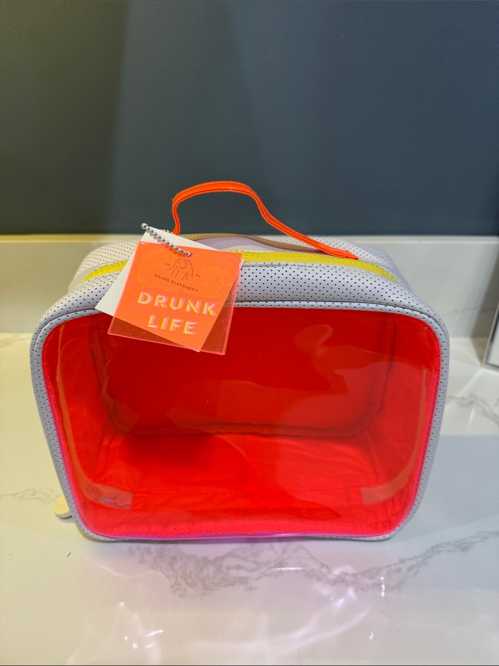 Drunk Elephant Neon Orange and white Clear Cosmetic Case